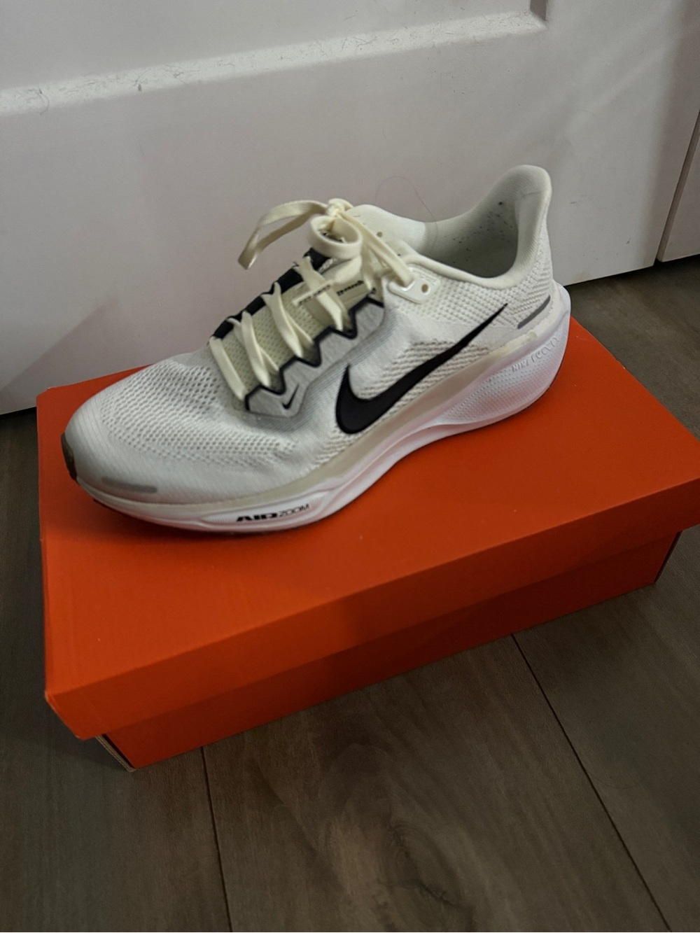 Nike Women's Cream and Black Running Shoe with Black Swoosh